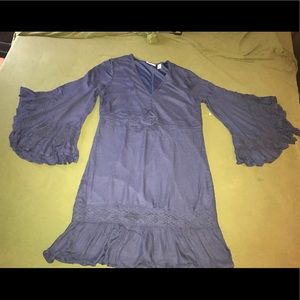 Brand new Flowy dress, never worn. Small size.